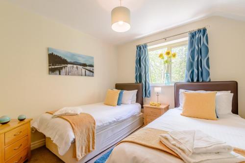 Ένα ή περισσότερα κρεβάτια σε δωμάτιο στο Cote Ghyll Mill Bed & Breakfast at Osmotherley