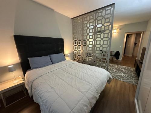 Postel nebo postele na pokoji v ubytování Hotel & Residence Sol Alphaville Flat