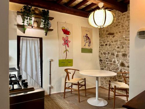 Фотография из галереи Al Paese Vecchio - Boutique house nel cuore del borgo в городе Сантарканджело-ди-Романья