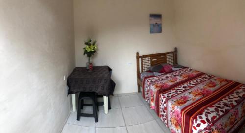 Un pat sau paturi într-o cameră la Hospedaje Maluli 09