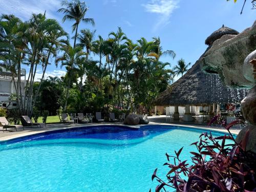 a pool at the resort at Premium Glamping - Pool Waterslide Wi-Fi & Private Patio Lounge in Puerto Vallarta