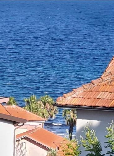 a view of the ocean from a house at Nonna Liliana in San Lorenzo al Mare