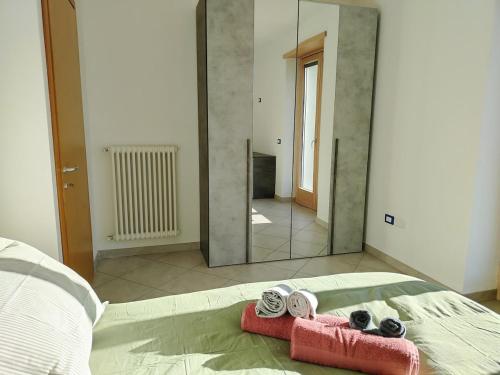 Un ou plusieurs lits dans un hébergement de l'établissement Appartamento da Nonna Anna