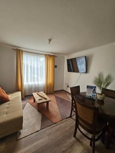 TV a/nebo společenská místnost v ubytování Acogedora casa centrica en Valdivia para 4 personas