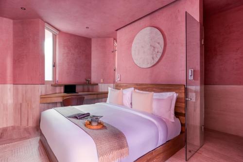 Postel nebo postele na pokoji v ubytování Laiva Hotel San Jose by Tasman