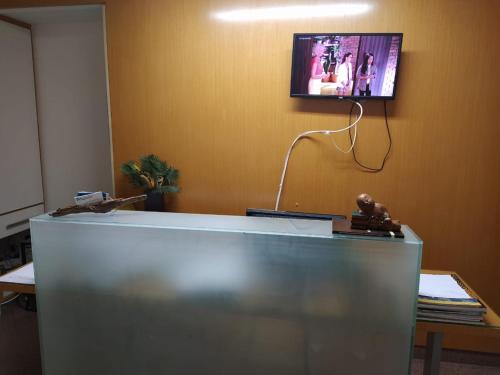 TV a/nebo společenská místnost v ubytování Recanto dos manacas