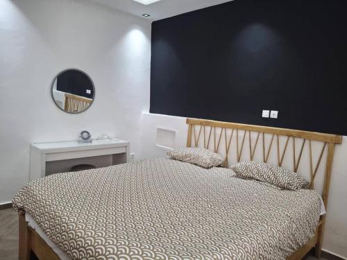 Giường trong phòng chung tại Marietou