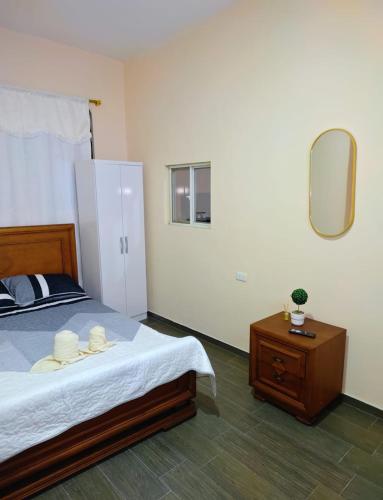 Giường trong phòng chung tại Dannas Pearl