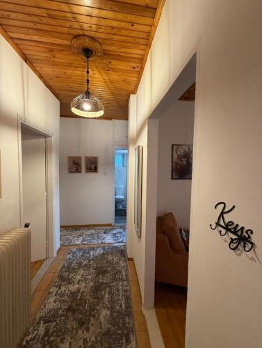 a hallway with a couch and a ceiling at Kastellia Horizon Villa in Graviá