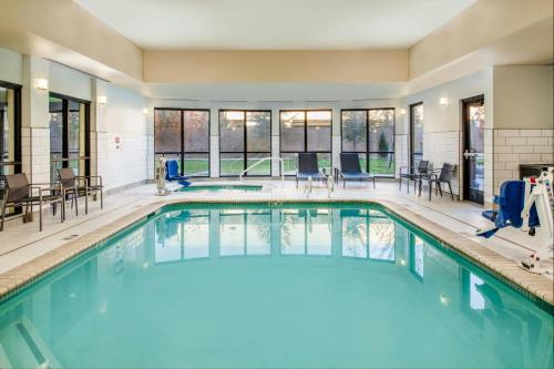 a swimming pool with blue water in a house at Courtyard Carson City in Carson City