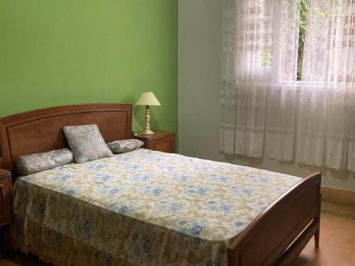 Ένα ή περισσότερα κρεβάτια σε δωμάτιο στο Quinta Hostaco