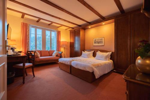 Giường trong phòng chung tại Hotel Regina