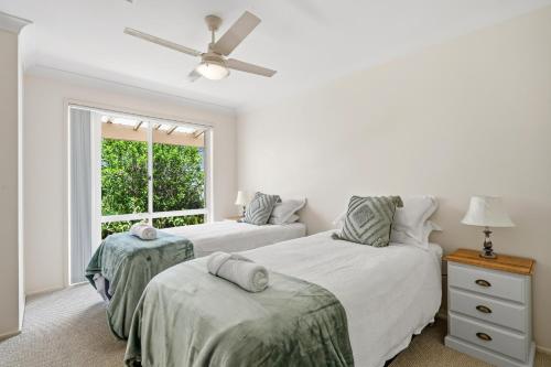 Ένα ή περισσότερα κρεβάτια σε δωμάτιο στο Nerissa on Newport