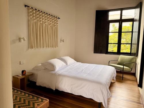 Postel nebo postele na pokoji v ubytování Casamía