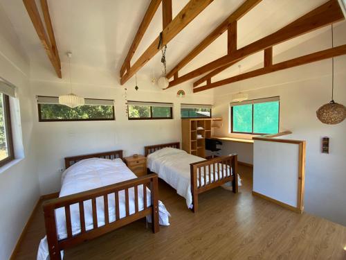 Ένα ή περισσότερα κρεβάτια σε δωμάτιο στο Careo2025