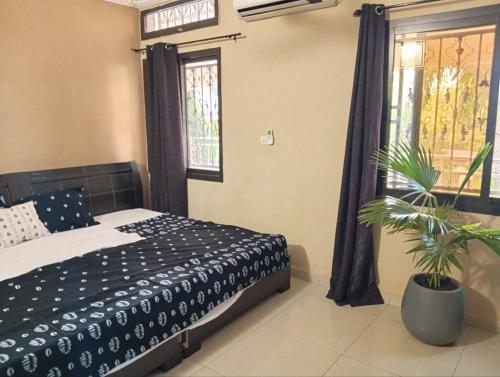 Postel nebo postele na pokoji v ubytování LA Maison Sur Le Fleuve