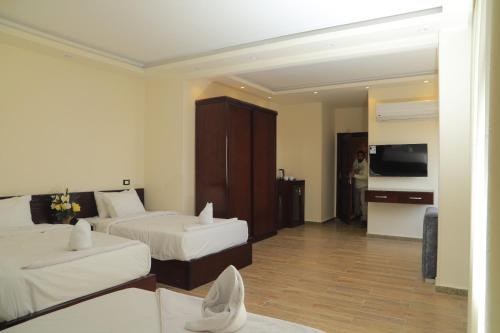 TV a/nebo společenská místnost v ubytování je w el Grand Museum Boutique