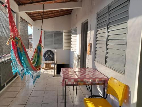 Et opholdsområde på Hospedagem CasAdobe Hostel Pirapora MG