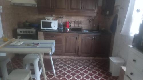 Η κουζίνα ή μικρή κουζίνα στο Alojamiento Luisito