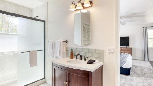 a white bathroom with a sink and a mirror at Hilltop by AvantStay Countryside Escape w Views in Paso Robles