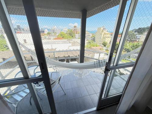 Un balcón o terraza en Residencial Mansur - Jurerê