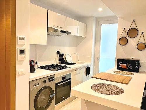 Η κουζίνα ή μικρή κουζίνα στο Casablanca Appartement haut standing CFC