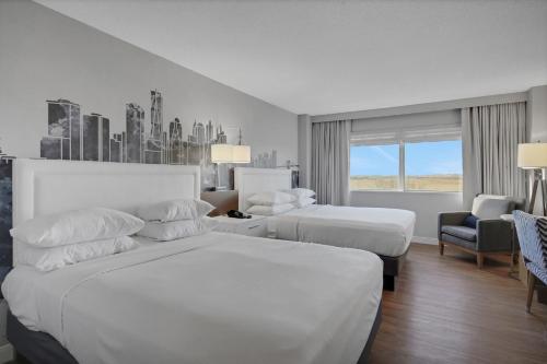 Giường trong phòng chung tại World of Blue 924 Beautiful QQ Hotel Rooms