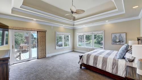 Ένα ή περισσότερα κρεβάτια σε δωμάτιο στο Island Point by AvantStay Sleeps 18 Dock