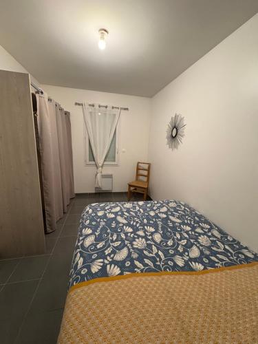 Кровать или кровати в номере Maison Élodie