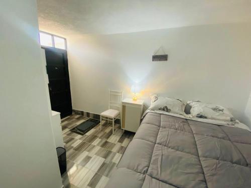 Postel nebo postele na pokoji v ubytování Habitación Privada con Baño Privado Cama Doble