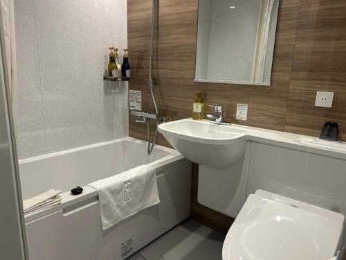 Koupelna v ubytování Ginza International Hotel