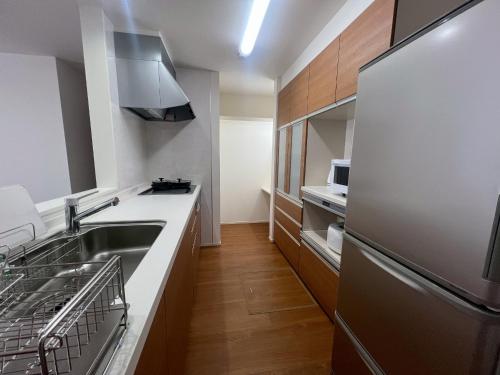 Kuchyň nebo kuchyňský kout v ubytování Mukae House