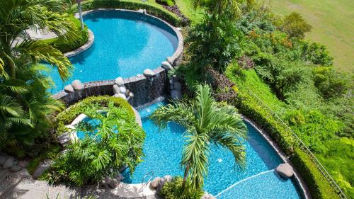 an aerial view of a pool at a resort at Montebello 2C - 3 bdr 3 bath Ocean View in La Mona