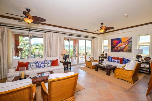 a living room with a couch and chairs and a table at Montebello 2C - 3 bdr 3 bath Ocean View in La Mona