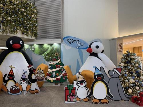 a group of penguins and christmas trees in a room at Phoenix Hotel Pyeongchang in Pyeongchang 