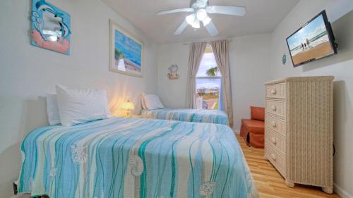 Postel nebo postele na pokoji v ubytování Salt Sun by AvantStay Beach Access Pool