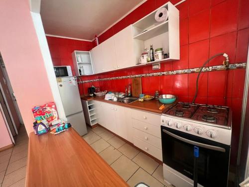 مطبخ أو مطبخ صغير في Departamento frente al mar