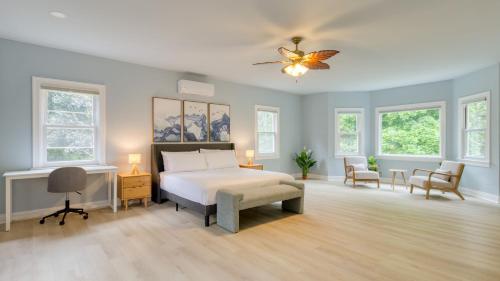 a bedroom with a bed and a butterfly on the ceiling at Game Farm Villa by AvantStay 10BDR Private Pond Spa Pool Family-Friendly in Catskill
