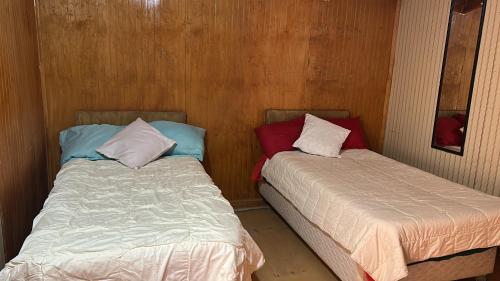 Una cama o camas en una habitación de Casa Azul