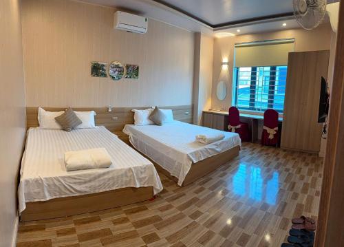 Giường trong phòng chung tại Hưng Phát Hotel - Gần Bến Xe Hà Tĩnh