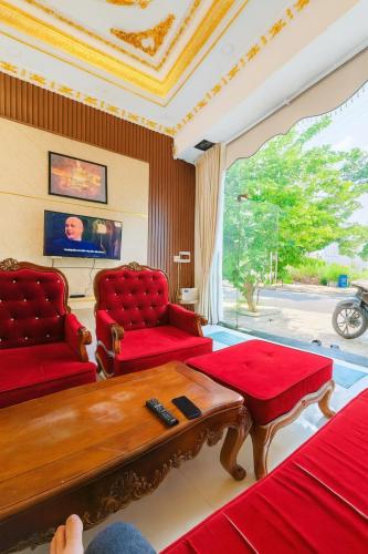 Posezení v ubytování Long Homestay Xuyên Á - Hotels