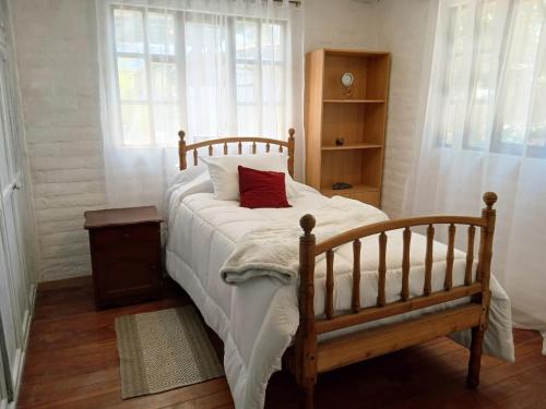 Ένα ή περισσότερα κρεβάτια σε δωμάτιο στο Casa de campo familiar con jardin y asadero