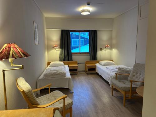Postel nebo postele na pokoji v ubytování Bjorliheimen Fjellhotell-Hotellrom