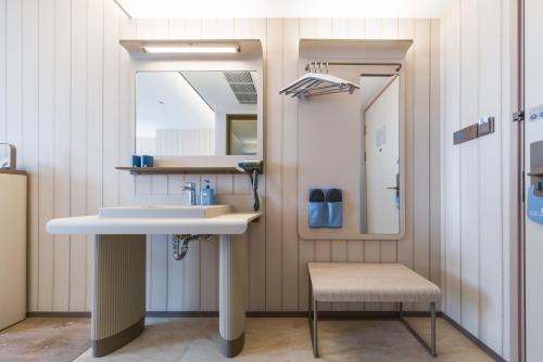 Et badeværelse på Hanting Hotel Shanghai International Tourism Resort Chuansha Road