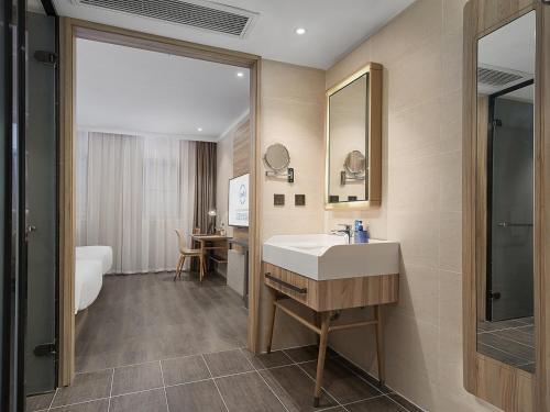 Phòng tắm tại Hanting Premium Hotel Nanjing Jiangpu Research Park