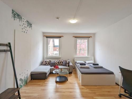 Кровать или кровати в номере Cozy Apartment in The Black Forest