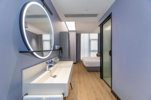 Koupelna v ubytování Hanting Hotel Suzhou Gusu Yungu Changjing Subway Station