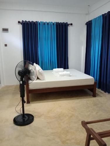 Ένα ή περισσότερα κρεβάτια σε δωμάτιο στο Aborigines vila