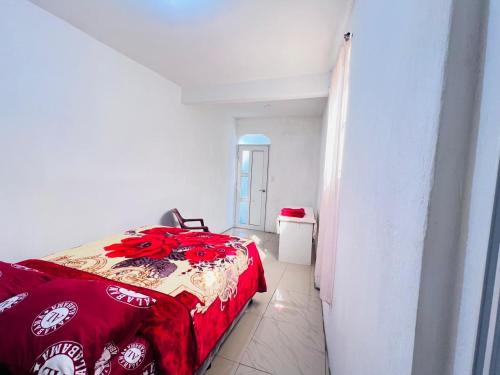 Postel nebo postele na pokoji v ubytování Hotel Julián Cotuc