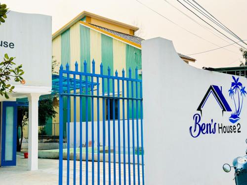 a building with a gate in front of a ball house at Ben's House 2 in Tam Ky
